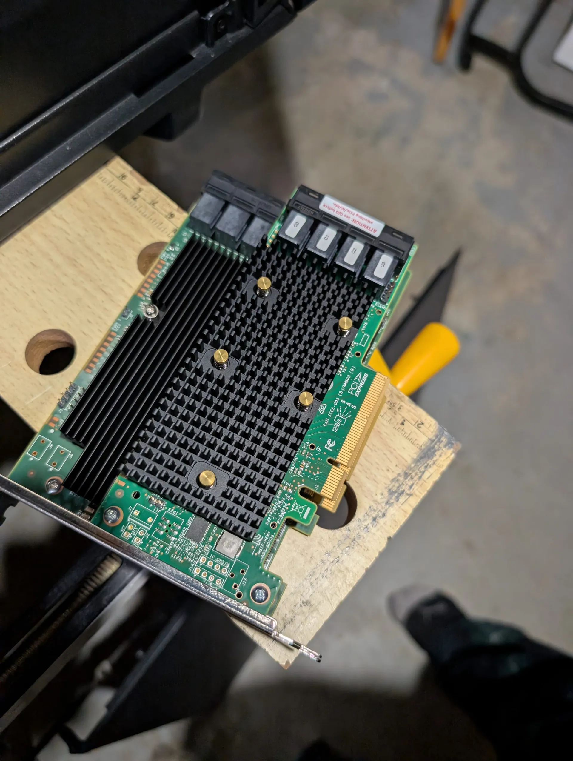 Picture of large cooling areas on both the LSI 9300 & 9400 16i's that can collect a lot of dust.