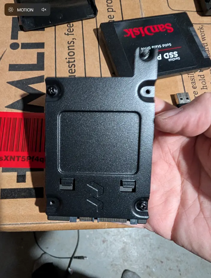 Picture of the drive sled that comes with the Fractal and can be slid into 2 spots on rear of Fractal case.