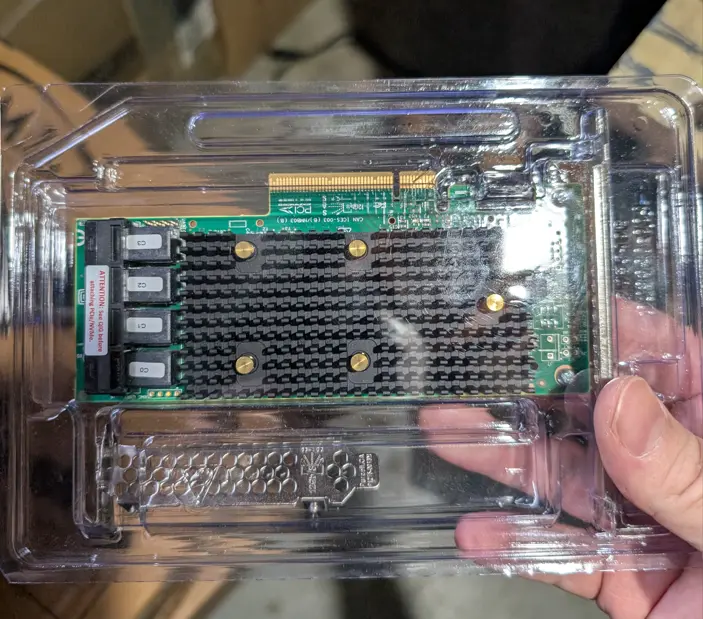 Picture of my LSI HBA 9400-16i, heart of the NAS function, brand new in plastic.